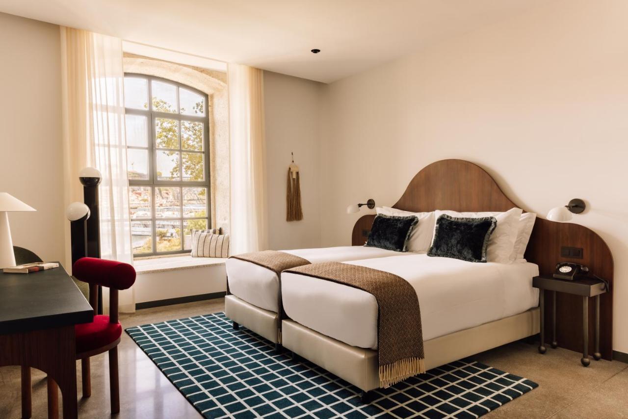 The Rebello Hotel & Spa - Small Luxury Hotels Of The World Vila Nova de Gaia Esterno foto A guest room at the Hotel 57