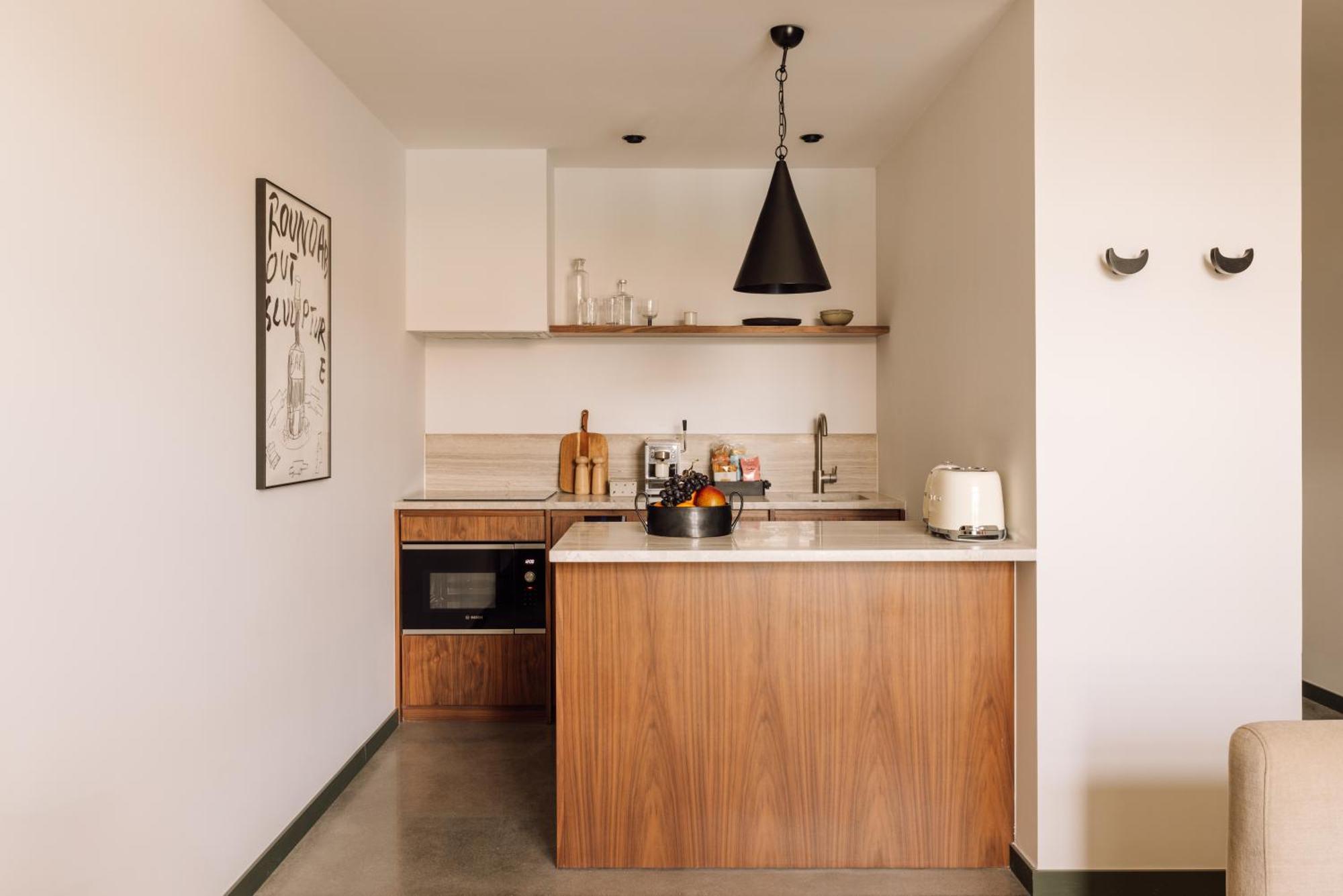The Rebello Hotel & Spa - Small Luxury Hotels Of The World Vila Nova de Gaia Esterno foto A kitchen in a micro apartment
